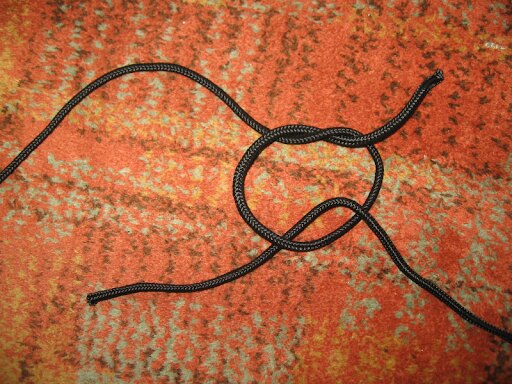 Fisherman's knot step 1