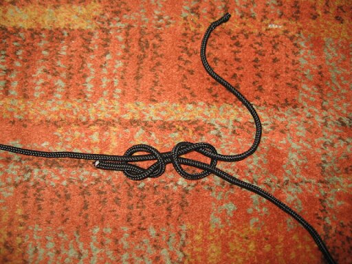 Fisherman's knot step 2