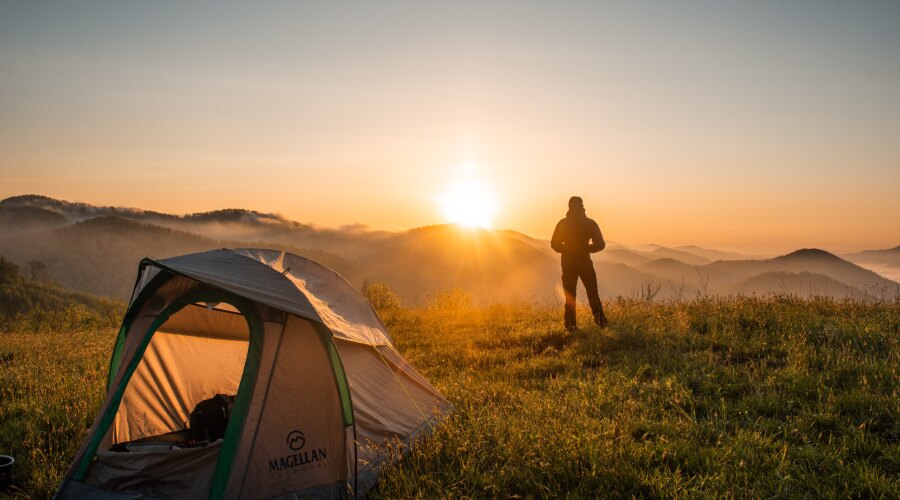 Man in front of the tent 