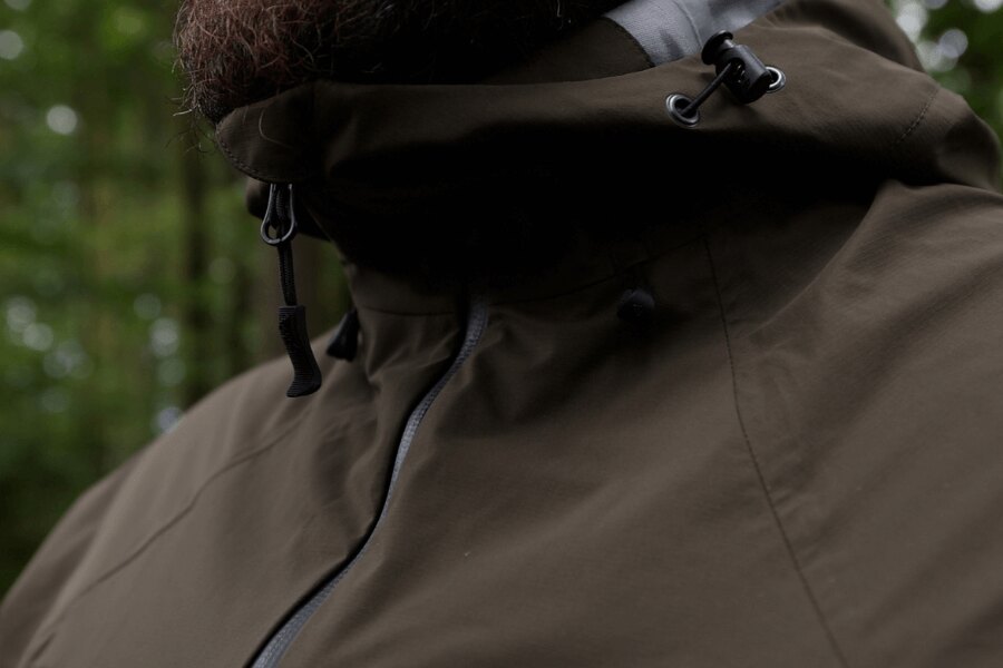 A detail of a jacket zipper with a chin guard Helikon-Tex Squall