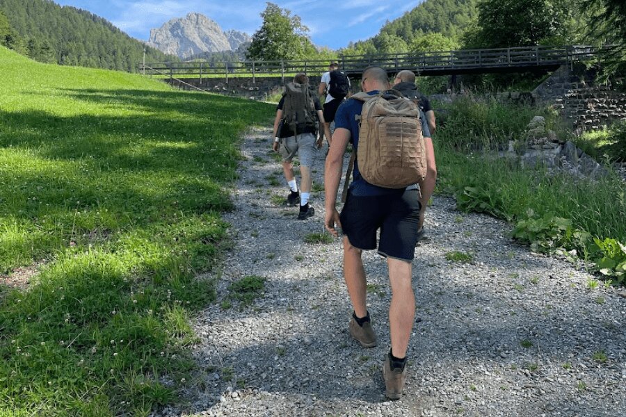 Hikers in the mountains with backpacks. Source: Rigad