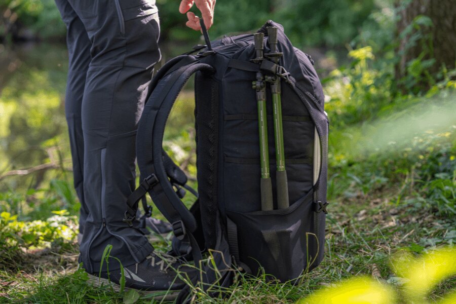 Summit Helikon-Tex backpack, carrying handle, side view, trekking poles. Source: L.G. (author)