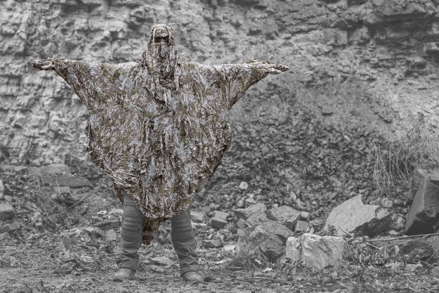 Ghosthood anti-drone poncho, CONCAMO pattern, the camouflage blends with its surroundings. Source: ghost-hood.com