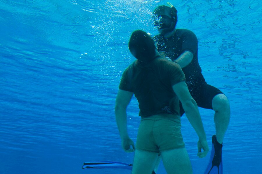 A diving training in a swimming pool at Navy SEALs. Source: Michal Ščepko and NSWC