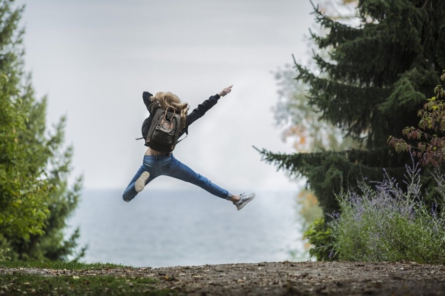 Woman jumping in nature