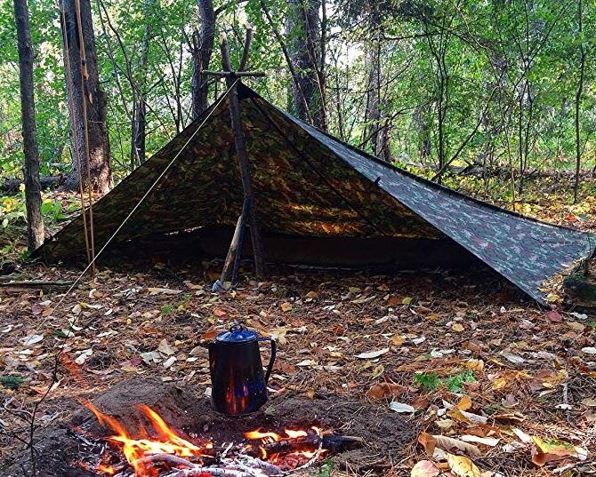 A tarp shelter in the woods